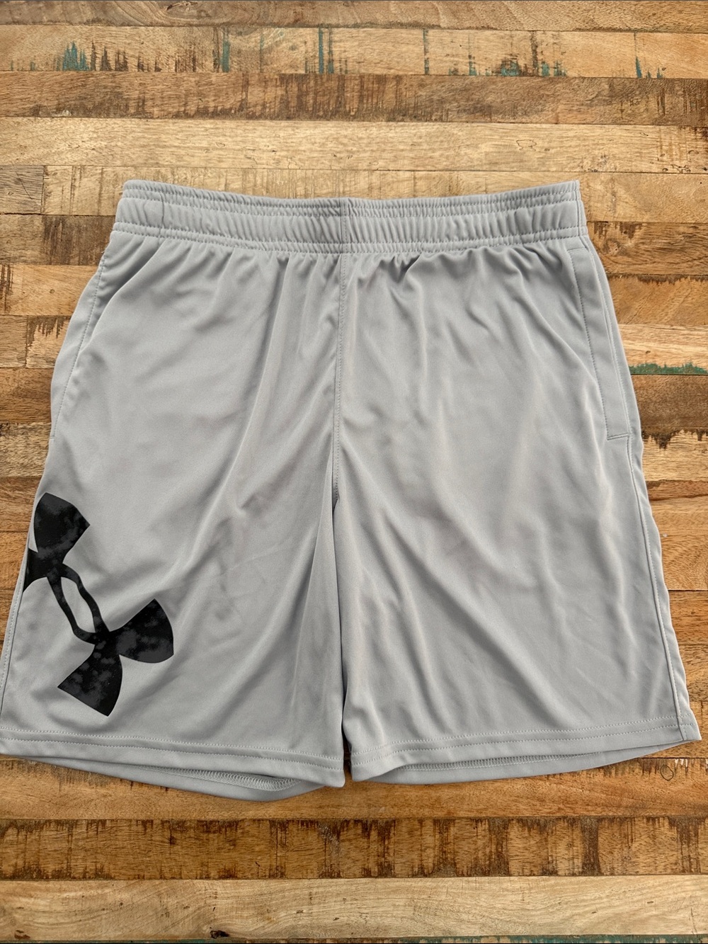 Under Armour Light Gray Athletic Shorts with Black Logo
